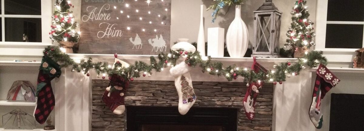 fireplace mantel decorated for Christmas