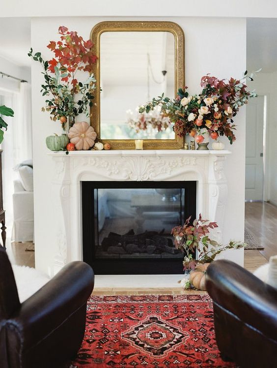 mantel with mirror and autum leaves