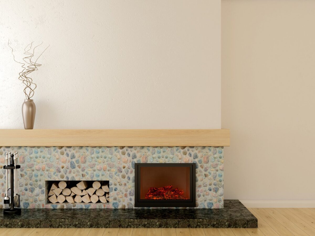 Small individual stone fireplace which are all painted different shades.