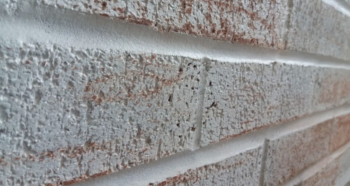 Whitewashed brick.