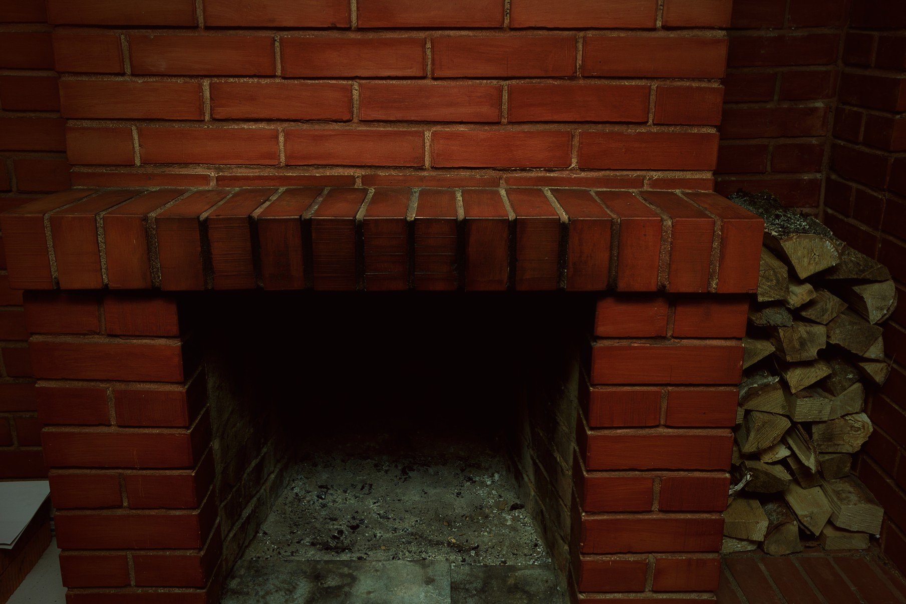 red brick fireplace dirty