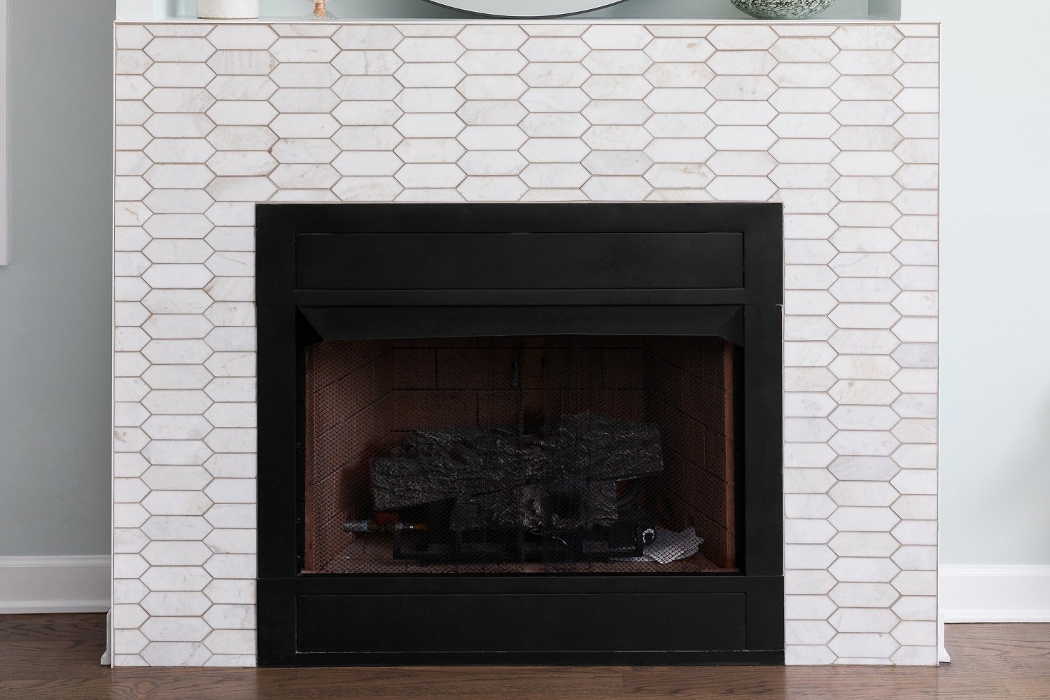 Use white subway tiles instead of brick 